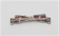 A 14k white gold diamond and ruby Art Deco brooch. - image-2