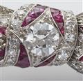 A 14k white gold diamond and ruby Art Deco brooch. - image-3
