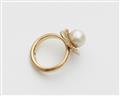 An 18k gold and cultured pearl ring. - image-2