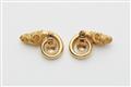 A pair of Greek 18k gold archaeologial revival ram's head clip earrings. - image-2