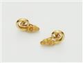 A pair of Greek 18k gold archaeologial revival ram's head clip earrings. - image-1