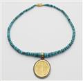 A custom made oxydised silver, gold and Tibetan turquoise pendant necklace. - image-1