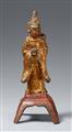 A lacquered and gilt bronze figure of a female attendant. Ming dynasty - image-1