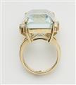 An 18k gold diamond and step-cut natural aquamarine ring. - image-2