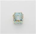An 18k gold diamond and step-cut natural aquamarine ring. - image-1