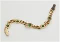 An 18k gold chain bracelet with cabochon-cut emeralds. - image-2