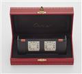 A stainless steel and coral Cartier two time zone travel alarm clock. - image-3