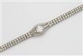 An Art Deco platinum and diamond bracelet with a transition-cut diamond solitaire of ca. 2.15 ct. - image-2