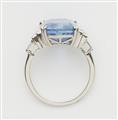 A platinum diamond and natural Ceylon sapphire ring. - image-2