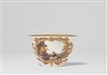 An early Meissen porcelain tea bowl with a peasant scene - image-3