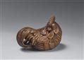 A wood netsuke of a proud rooster. - image-1