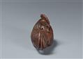 A wood netsuke of a proud rooster. - image-3