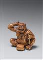 A large boxwood okimono netsuke of a laughing oni. Late 19th century - image-1