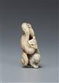 An ivory netsuke of a dragon and a tiger. 19th century - image-4