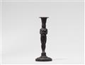 A cast iron candlestick formed as an Egyptian lady - image-1