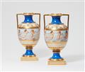 A pair of Berlin KPM porcelain vases with amoretti - image-1