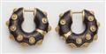 A pair of German 18k gold black enamel and granulation hoop earrings. - image-3
