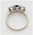 An 18k gold sapphire and diamond three stone ring. - image-2