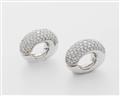 A pair of German 18k white gold and pavé-set diamond clip earrings. - image-1
