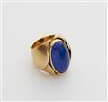 A solid forged 18k gold and lapis lazuli cabochon ring. - image-1