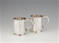 A pair of George I silver mugs - image-1