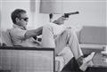 John Dominis - Steve McQueen Aims a Pistol in His Living Room, CA - image-1