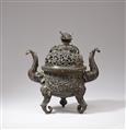A large elephant tripod bronze incense burner and cover.
18th century or later - image-2