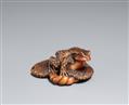 A large boxwood okimono-type netsuke of a toad on a straw sandal. Ise, late 19th century - image-1