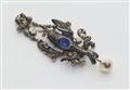 A silver enamel various gemstone and Ceylon sapphire Renaissance style pendant depicting a bird of paradise on a perch. - image-3