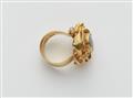 A German 18k gold and harlekin opal triplet ring. - image-2
