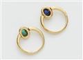 A pair of German 18/21k gold and coloured gemstone cabochon rings. - image-2