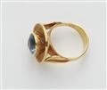 A German 18k gold granulation and a London blue topaz ring. - image-2