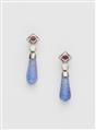 A pair of German 14k white gold diamond ruby and tanzanite pampile stud earrings. - image-1