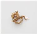 An 18k gold and diamond dragon brooch. - image-1