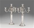 A pair of Strasbourg silver candelabra - image-1
