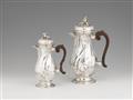 A pair of Augsburg Rococo silver jugs - image-1