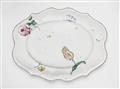 An oval Strasbourg faience platter with 'fleur fines' decor - image-1
