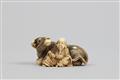 An ivory netsuke of a Chinese scholar sitting next to an ox. 19th century - image-3