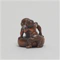 A boxwood netsuke of Daruma or rakan being washed by an oni. Second half 19th entury - image-4