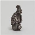 A silver netsuke of courtier playing foot ball. 19th century - image-3