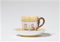 A Berlin KPM porcelain cup with putti - image-2