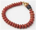 A red foam coral necklace with a one of a kind 18/21k gold, carved ebony and chrysoberyl cat's eye sculptural head clasp. - image-2