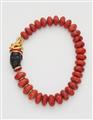A red foam coral necklace with a one of a kind 18/21k gold, carved ebony and chrysoberyl cat's eye sculptural head clasp. - image-1