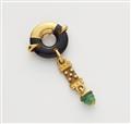 A German 18k gold ebony disc diamond and emerald pendant. - image-1
