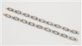 A silver 14k gold and diamond chain necklace convertable into two bracelets. - image-2