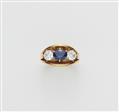 A German18 kt yellow gold diamond and sapphire three stone ring. - image-1