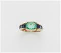 A German 18k gold sapphire and emerald ring. - image-1