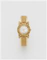 An 18k yellow gold and yellow sapphire Hemmerle ladies' wristwatch. - image-1