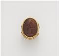 A German 18k gold and carnelian intaglio ring. - image-1