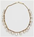 An Edwardian probably 9k gold and moonstone cabochon fringe necklace. - image-1